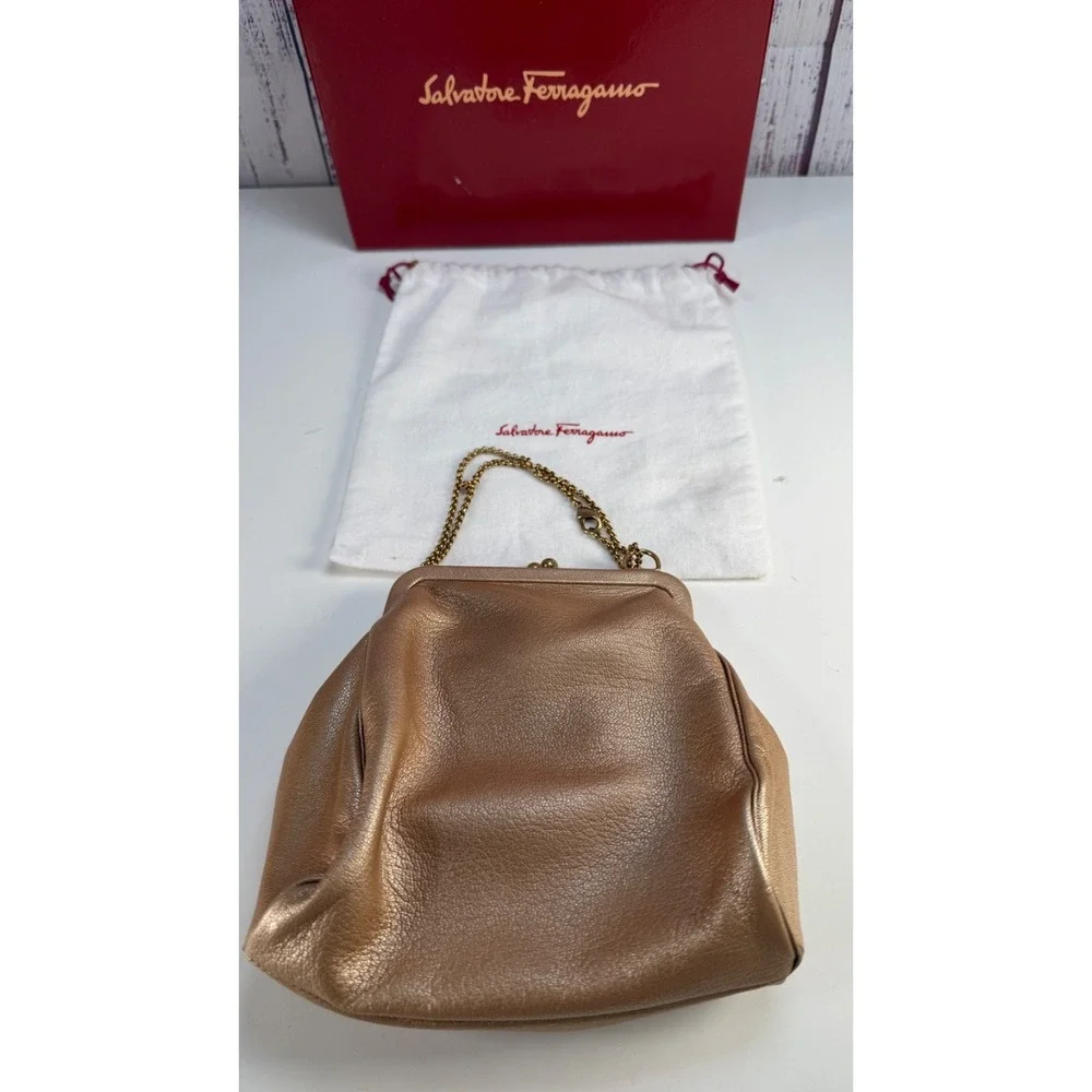 Auth Salvatore Ferragamo Gold Turtle clasp Metallic leather clutch w/dustbag